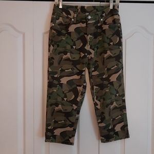 Camouflage cropped jeans with stud detail.
